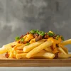 PAPAS CHEDDAR, BACON Y VERDEO