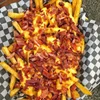 papas con cheddar y panceta