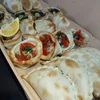 TABLA DE EMPANADAS + 1 MANAOS